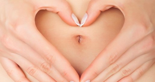 Foto von Bauch mit Händen