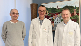 Internationaler HPV-Tag (© Heike Korber) Foto der beiden Ärzte mit Betroffenem