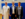 Forum Notfallmedizin (© Klinikum Straubing) Der Chefarzt links im Arzt-Kittel mit weißem Haar und Bart neben dem Oberarzt in Jackett, dunkel und weißes Hemd, Brille und der Oberärztin mit Brille in Jeans, alle freundlich lächelnd vor zwei Rollups mit dem Logo des Klinikums